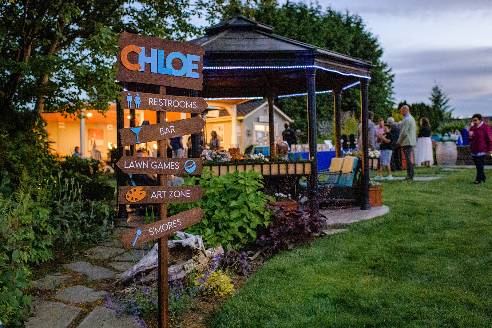 Details of a party sign in a garden party built with Party Supplies Seattle