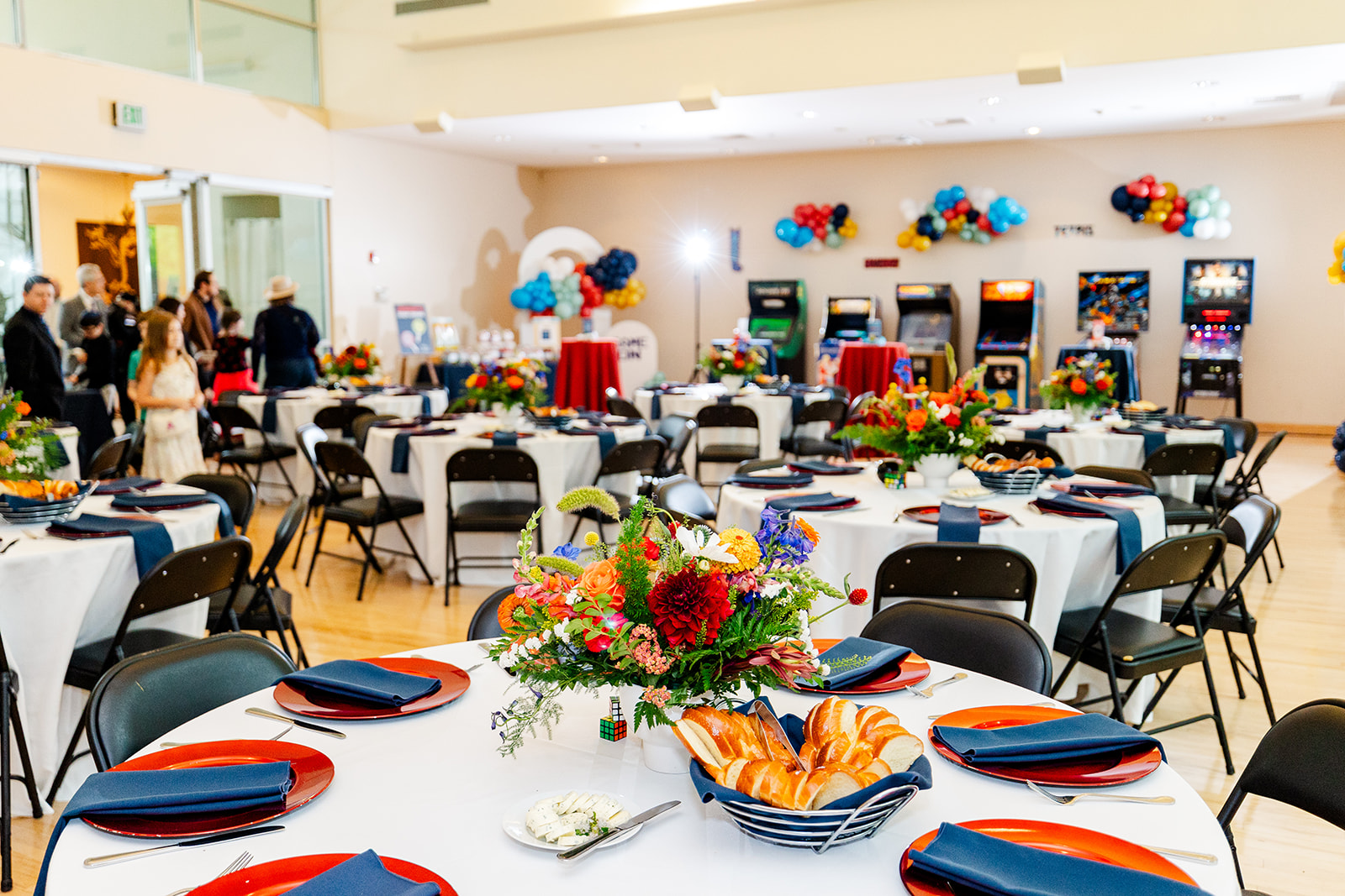 Details of a bar mitzvah reception set up with bread and flowers